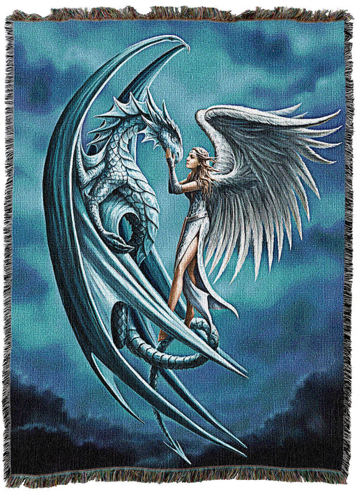Tapestry blanket with art by Anne Stokes showing a silver dragon and an angel hovering in midair against a cloudy blue backdrop