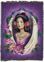 Tapestry blanket with artwork by Brigid Ashwood. An angel with black hair adorned in flowers is framed by her white wings and more lotus blossoms on a purple backdrop