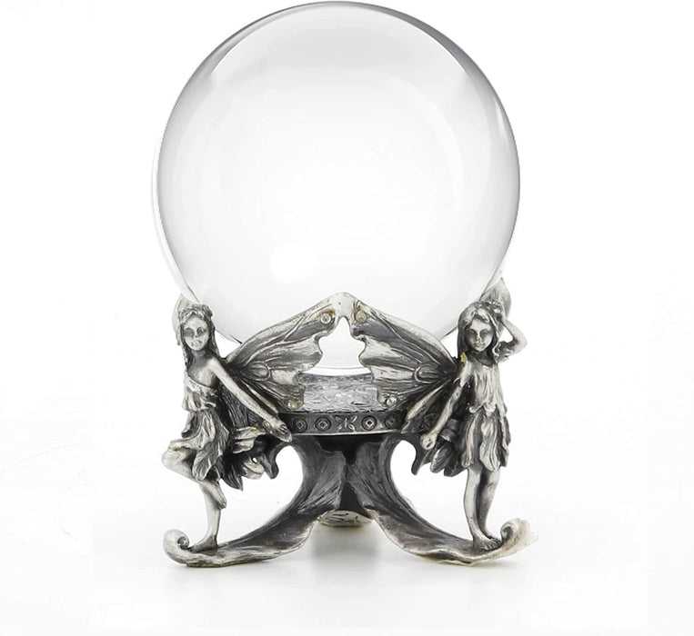 Crystal ball resting on the wings of three fairies