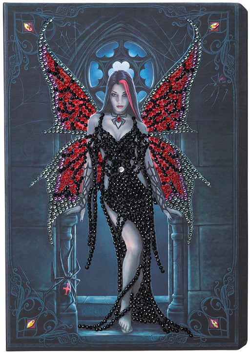 Crystal art journal cover showing Arachnafaria fairy by artist Anne Stokes, with red and black wings and matching hair, in a black dress. Standing in front of a Gothic window with a black widow spider nearby.