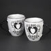 Black and white mug set of two with "Love Birds" and raven design and heart-shaped handle