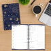Goal Getter Mystic Cosmos planner shown on a desk 
