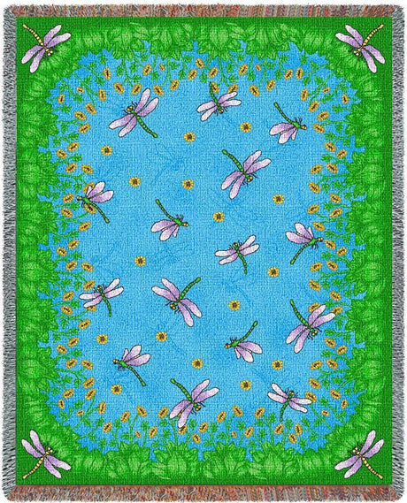 Tapestry throw blanket with purple winged dragonflies over a blue pond with green border