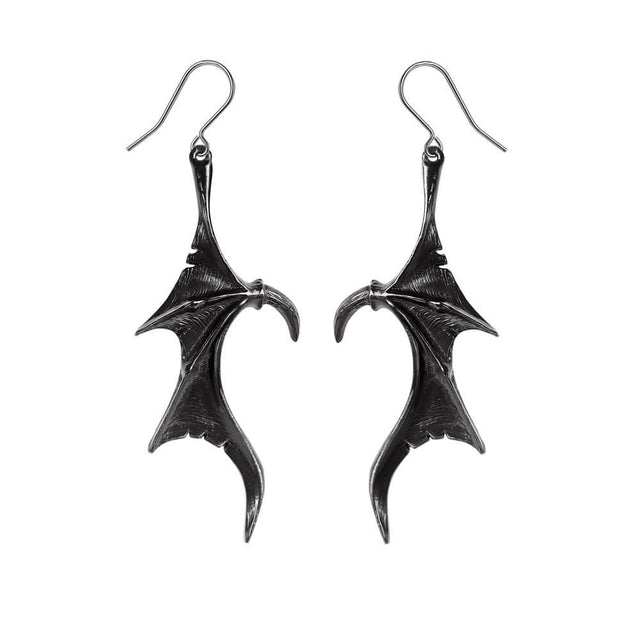 A pair of earrings with dangling black metal dragon wings