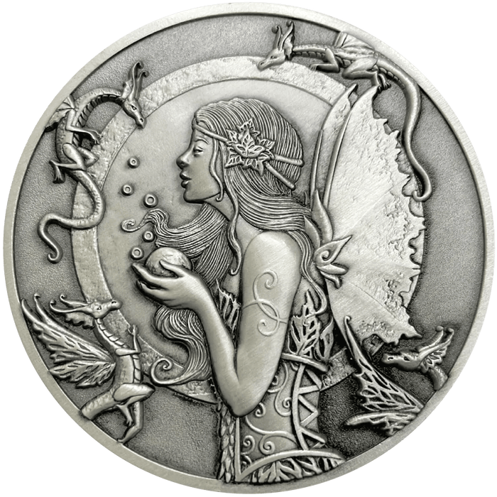 Dragon Spell Goliath Coin featuring Amy Brown art with a fairy surrounded by dragons in antique silver color