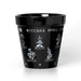 Black ceramic plant pot with the text "Witches Spell Garden" at the top. There are images of herbs including Basil, Mint, Wolfsbane and more, and pentacle designs.