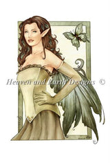 The art by Marjolein Gulinski features a fairy in shades of green, with rich auburn hair. She stands with hands on tops, and a butterfly accompanies her.