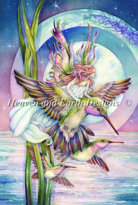 Cross stitch design of fairy in white dress riding a purple and green hummingbird. Two more birds flit through the reeds above a pond under a stylized full moon