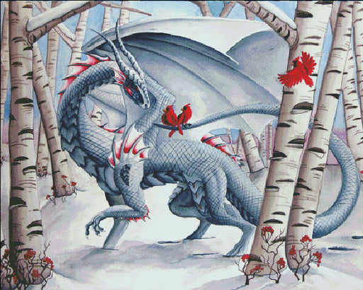 The artwork of Carla Morrow features a silver dragon walking through a winter forest. Snow lays thick on the ground, and contrasting with the white of the birch trees are lively red cardinal birds. Cross stick mockup