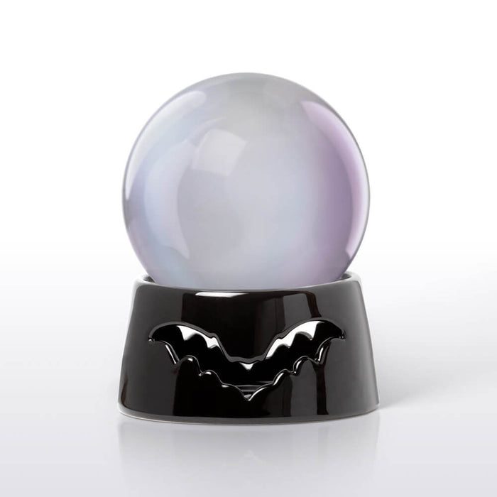 Bat mug warmer shown without a mug, and instead a crystal ball rests on top