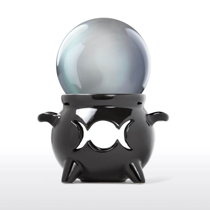 Ceramic black Triple Moon cauldron warmer shown with a crystal ball on top instead 