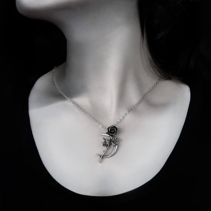 Black rose and crescent moon necklace worn