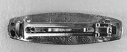Back of spiral hairclip, showing barrette clip