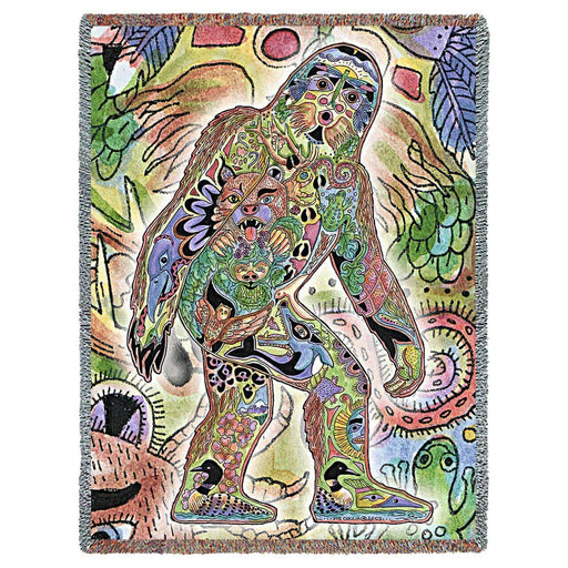 Sasquatch tapestry blanket. Bigfoot shape is filled with other animals and nature