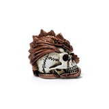 Miniature figurine of a bronze dragon curling around and through a human skull.