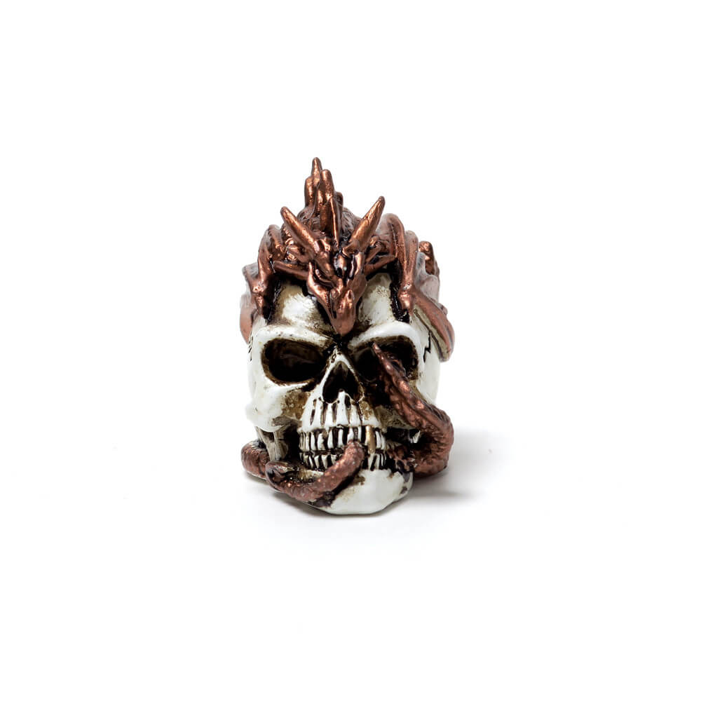 Miniature figurine of a bronze dragon curling around and through a human skull.