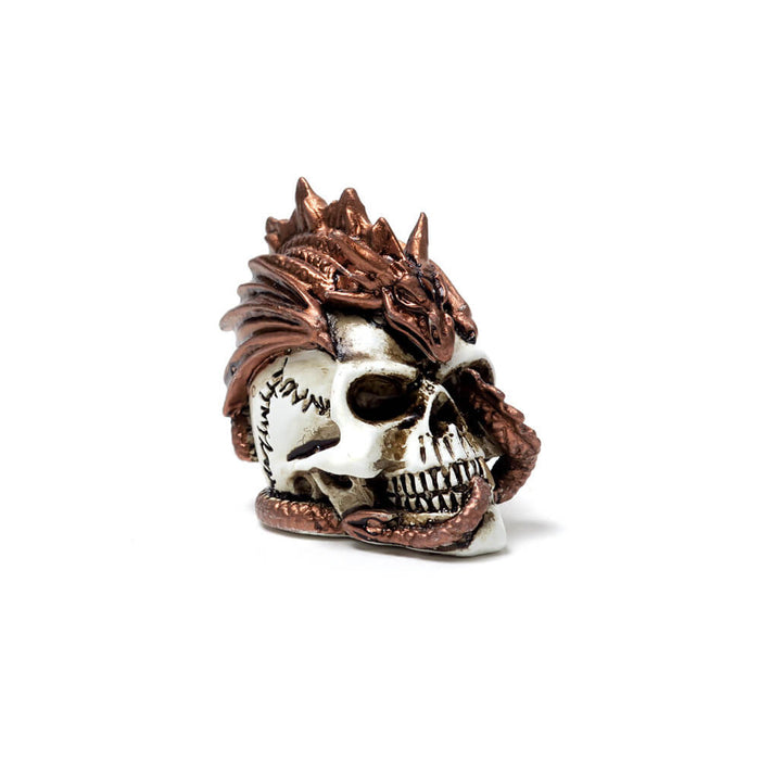 Miniature figurine of a bronze dragon curling around and through a human skull.