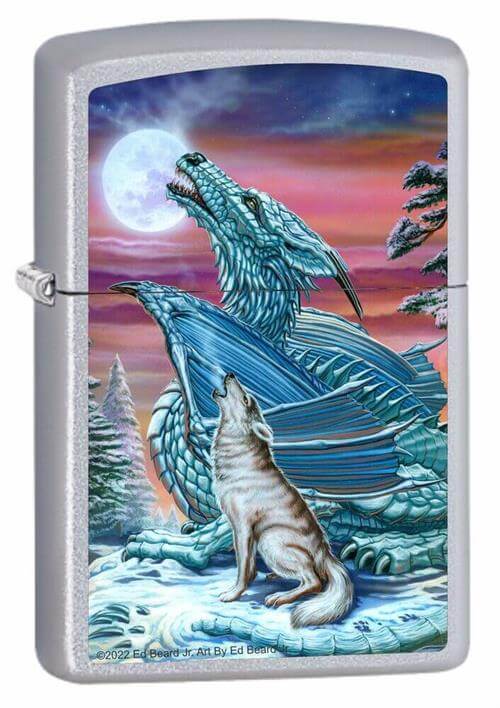 Zippo lighter featuring a blue-green dragon and a grey and white wolf howling at the moon together in a snowy landscape.