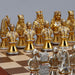Medieval Crusades chess set, close up showing gold and silver pieces on wooden board