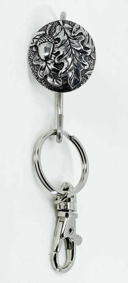Pewter oak leaf and acorn medallion tops a purse hook with a clip for your keys