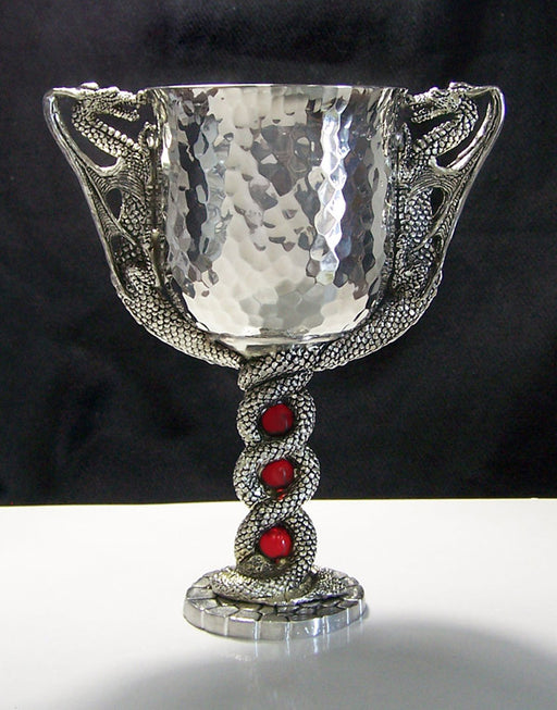 hammered pewter wine goblet with dragons on both sides and their tails twined together for stem and base outlined in gems.