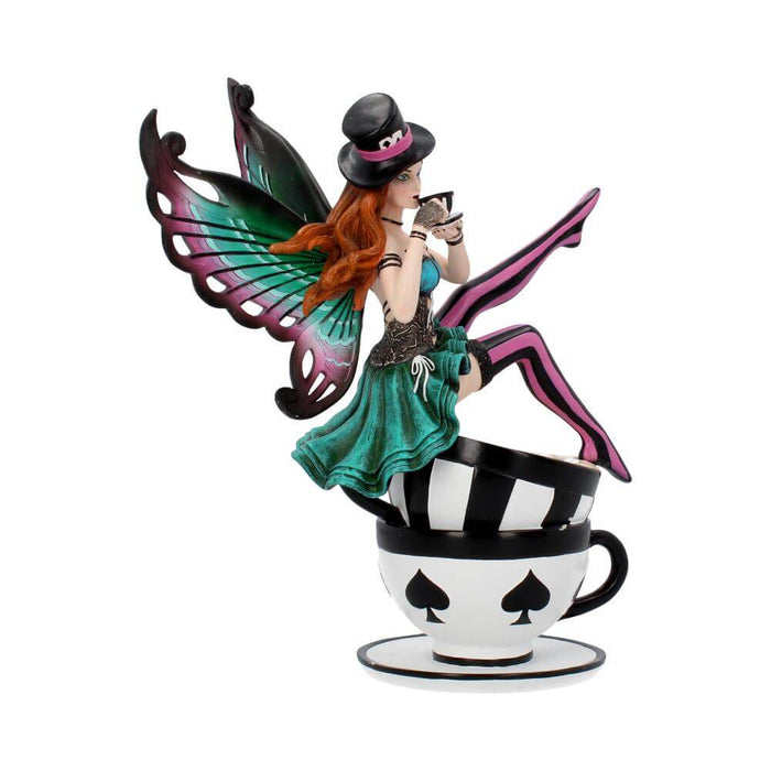 Mad Hatter fairy sitting on two teacups and drinking a smaller cup of tea. Done in a teal, pink and black color scheme, with red hair. Side view, showing legs kicked up