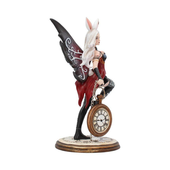White Rabbit fairy with bunny ears and a pocket watch, done in shades of maroon, gold and black. Side view