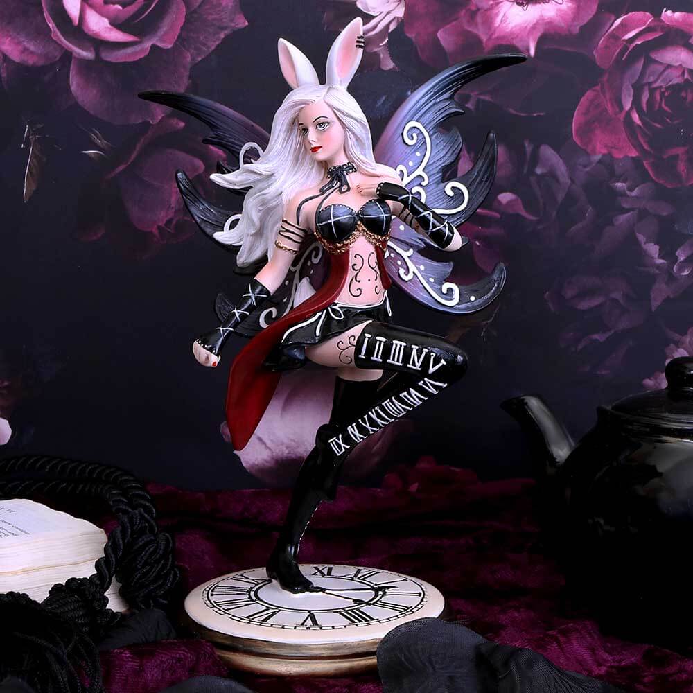 White Rabbit fairy with bunny ears and a pocket watch, done in shades of maroon, gold and black. She stands on a clock base. Shown without pocket watch