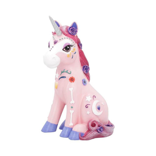 Pink unicorn decorated with bones, flowers, stars and moon figurine