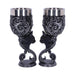 Black Cat goblet pair. Each wine glass has a black cat with purple eyes on the stem and silver swirls on the cup, with a stainless steel insert