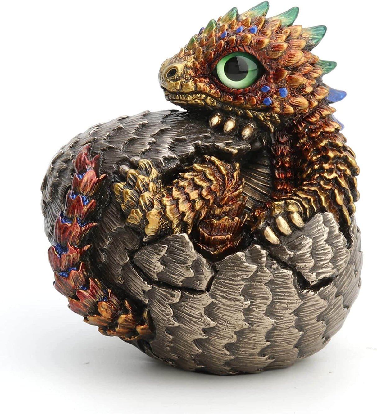 Baby dragon hatching from egg, done in shades of gold and red with blue and yellow accents and a green eye