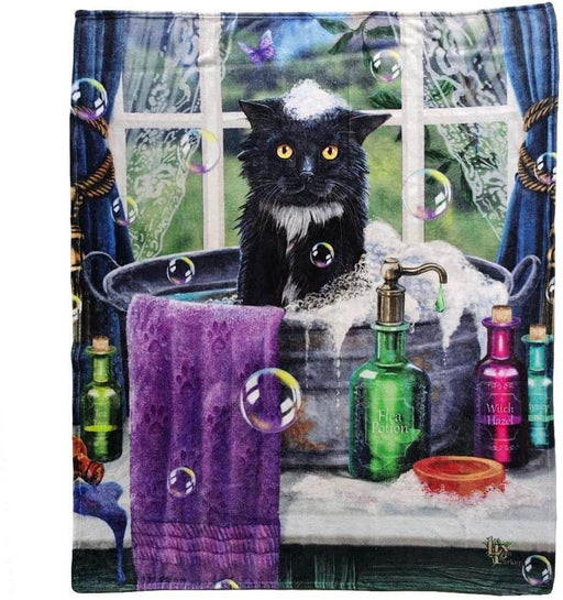 Fleece throw with a black and white cat in a soapy bathtub. Surrounded by bubbles, potions, and a purple towel with a butterfly in the background