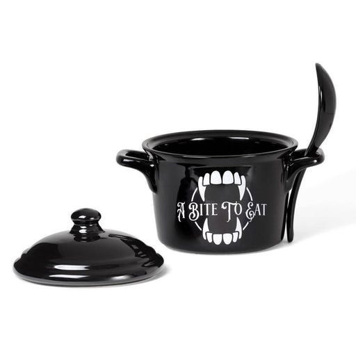 Black crock with lid featuring white fangs and "A Bite To Eat" with matching spoon