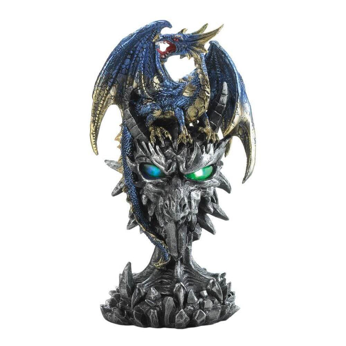 Blue and gold dragon perched on a rocky gray dragon head with light-up eyes. The eyes shine blue and green with LEDs