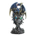 Blue and gold dragon perched on a rocky gray dragon head with light-up eyes. The eyes shine blue and green with LEDs