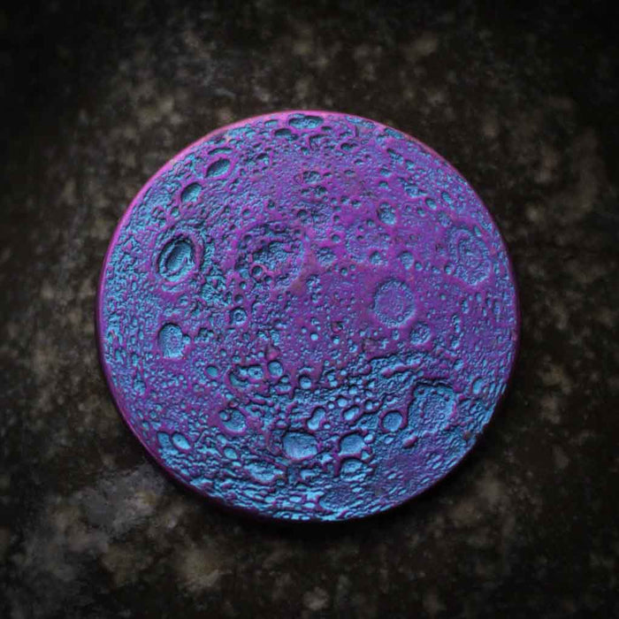 Other side of the blue and purple full moon coin