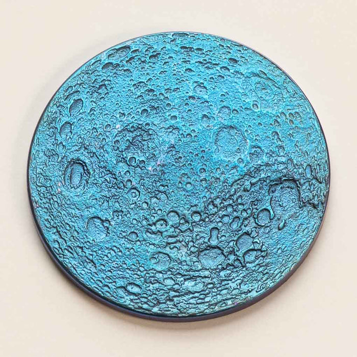 Other side of the Full moon coin in blue anodized niobium