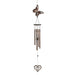 Metal and pine wind chime with a butterfly on top and a swirling heart dangling at the bottom