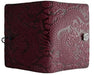 Leather journal with all over dragon design, shown in wine