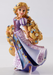 Disney Rapunzel Couture de Force, long blond hair and a purple dress with lots of flowers