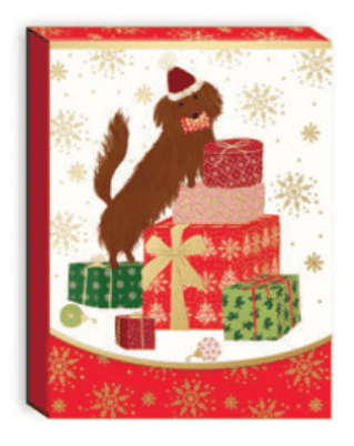 Pocket notepad with a brown dachshund dog on a pile of festive presents