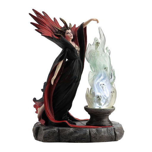 Sorceress in black and red robe summing forth demons. The cauldron has skeletal shapes rising from white fire