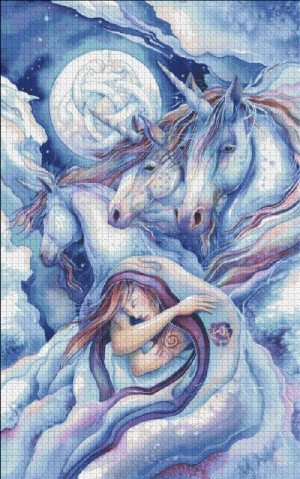 Cross stitch Mockup by Jody Bergsma - The image features a trio of gorgeous unicorns in front of a full moon, decorated with a horseshoe Celtic knot pattern. In the foreground, the dreamer slumbers on, wrapped in clouds. 