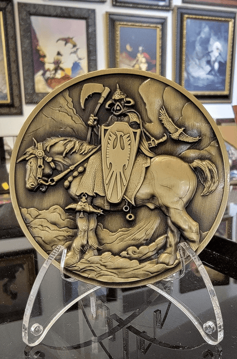 Coin on stand with artwork in the background