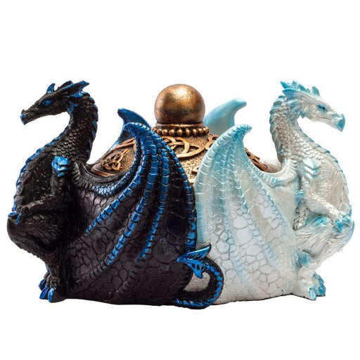Trinket box with a back to back white and black dragon around a gold center piece