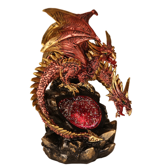red and gold dragon on a ruby crystal that lights up from within