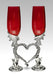 Red wedding dragon heart flutes nestling together in the shape of a heart 