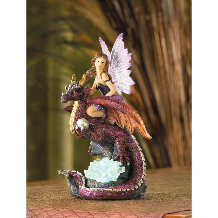 Dragon and fairy figurine with light-up LED crystal cluster, shown displayed.