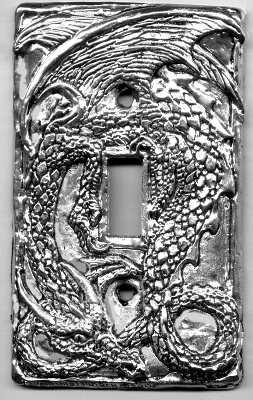 single tailed dragon switch plate made from metal