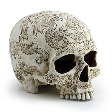 Side view of Skull with dragon and thistle engravings 